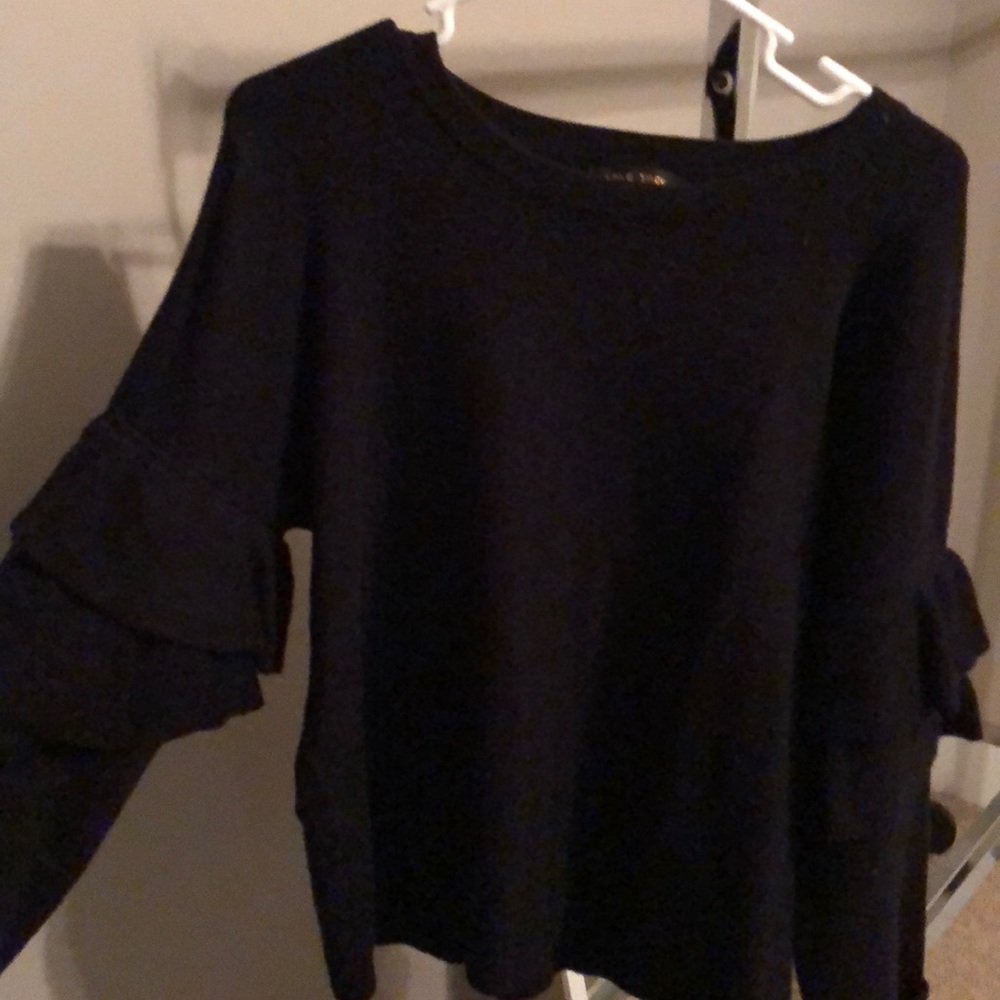 Black sweater with bell sleeves; never worn